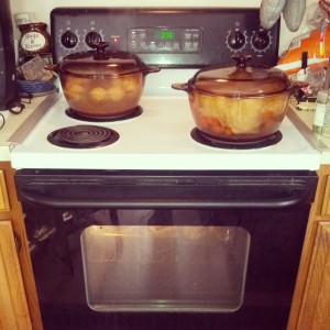 Matzo ball in the pot on the left. Gefilte Fish in the pot on the right and chicken in the oven.